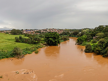 Paraopeba river overflowing after summer rains in Brumadinho, Minas Gerais, Brazil. Panoramic