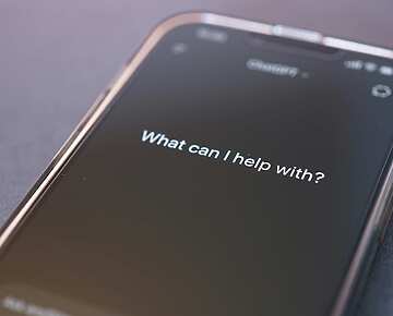 A mobile phone with an AI chat open