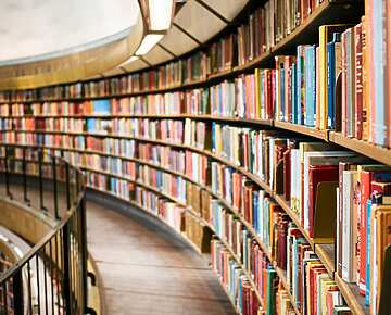 a library with books on shelves