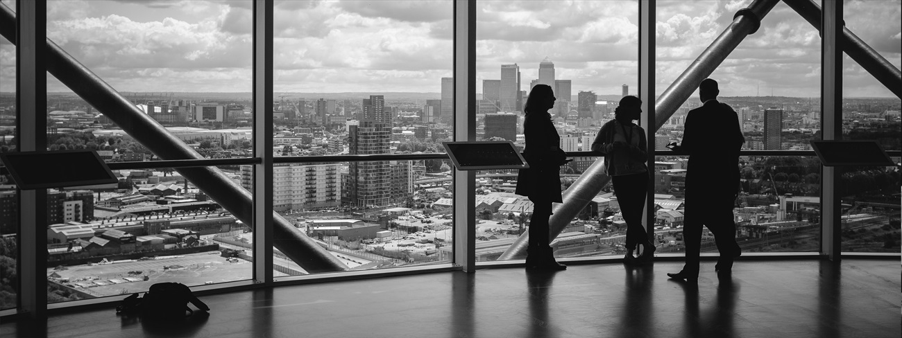 black and white photo of corporate people in office