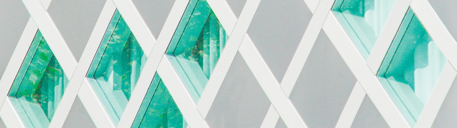 Abstract white structure with green glass