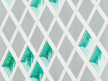 Abstract white structure with green glass