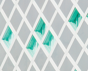 Abstract white structure with green glass