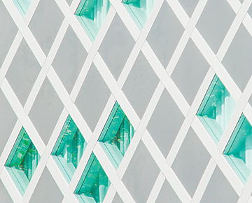 Abstract white structure with green glass