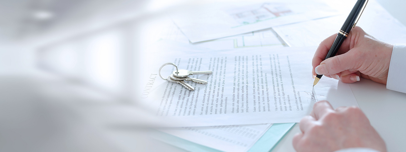 Home keys on top of paperwork