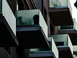 a building with persony balconies