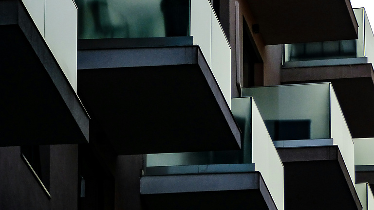 a building with persony balconies