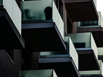 a building with persony balconies