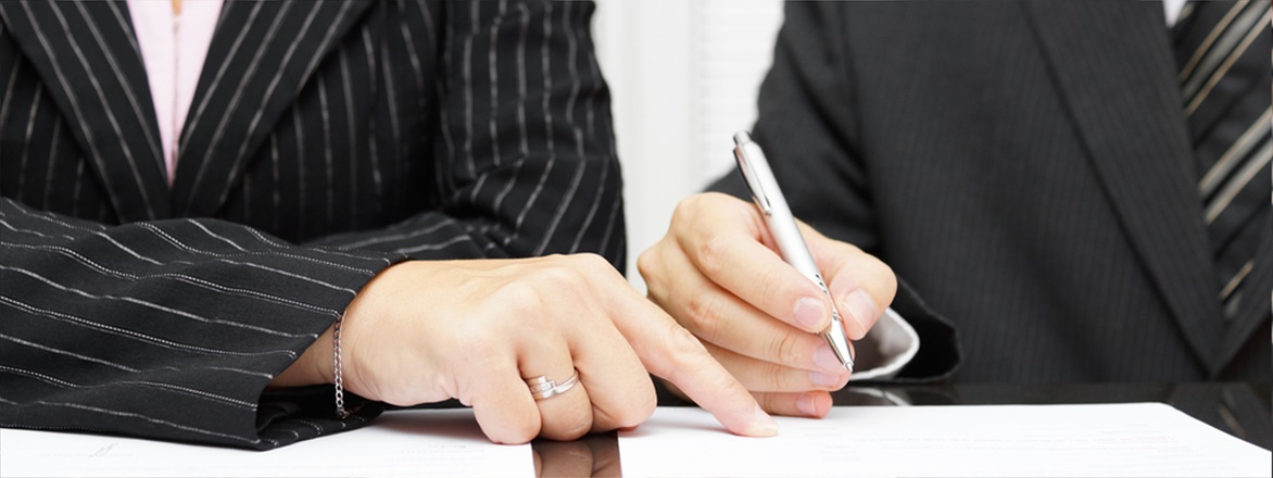 family filing divorce papers with lawyer