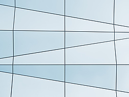 a white and blue wall with black lines