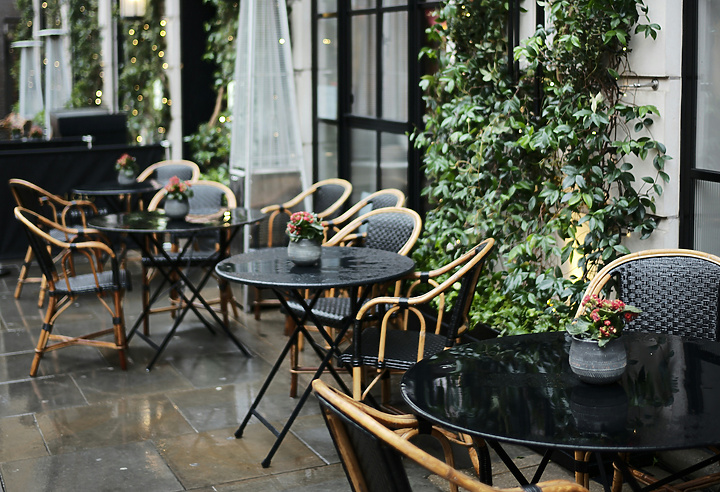 a tables and chairs outside of a building