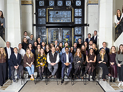 a group of people posing for a photo