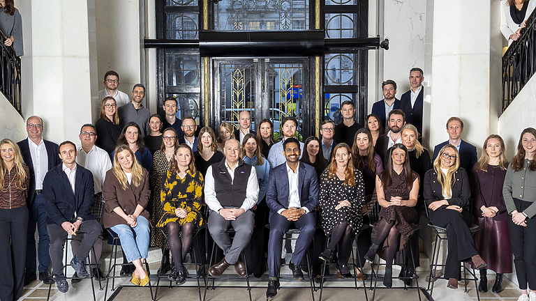 a group of people posing for a photo