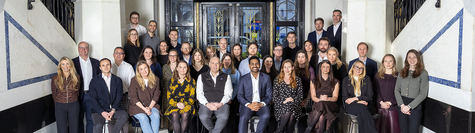 a group of people posing for a photo