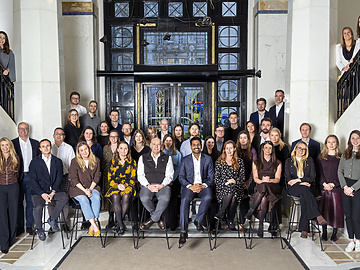 a group of people posing for a photo