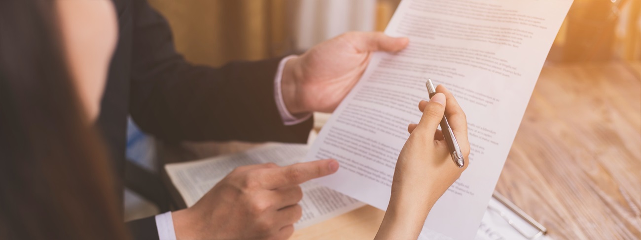 Lawyers reviewing paperwork