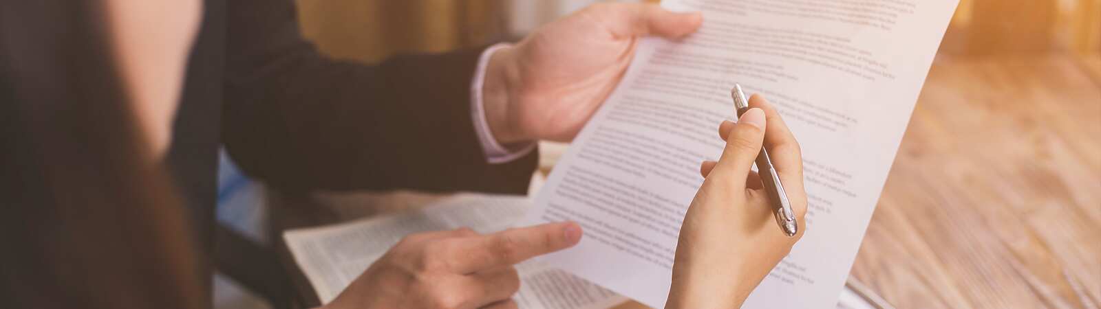 Lawyers reviewing paperwork