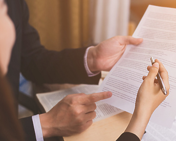 Lawyers reviewing paperwork