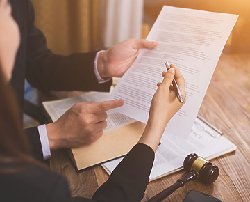 Lawyers reviewing paperwork