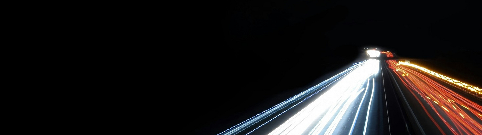 lights shining on black background