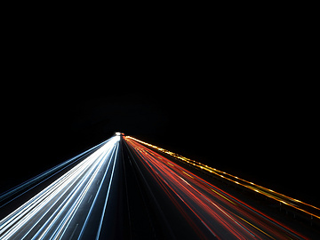 lights shining on black background