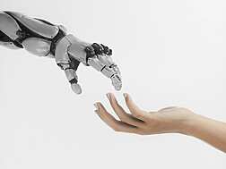 a-hand-reaching-out-towards-a-robot-hand