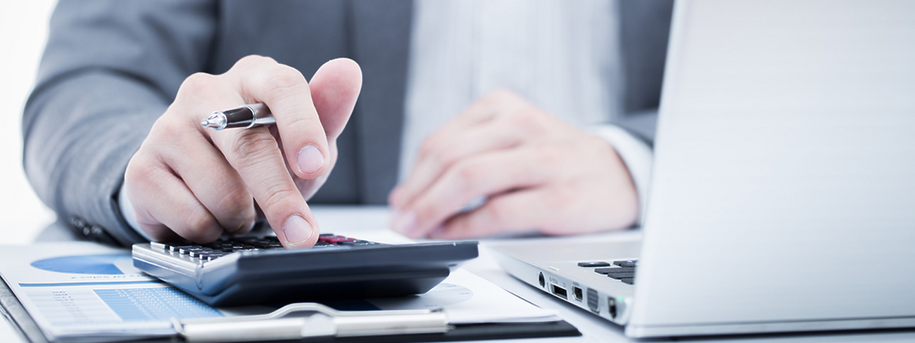 A person using a calculator